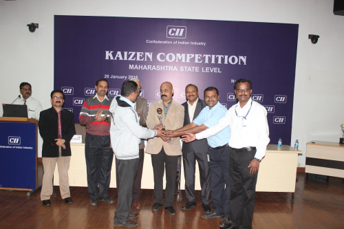 The KEPL team receiving the Kaizen award.