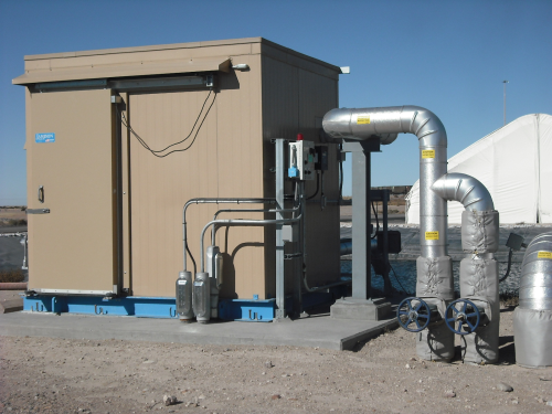 The pumps are enclosed in an 8 x 10 ft glass fobre enclosure. It features ventilation for summer and heat for winter to protect the pumps, piping, valves, lighting and control panel housed within the building.