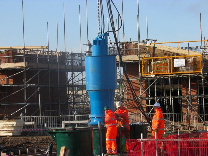 Installing one of the fish friendly pumps at the Wolferton pumping station.