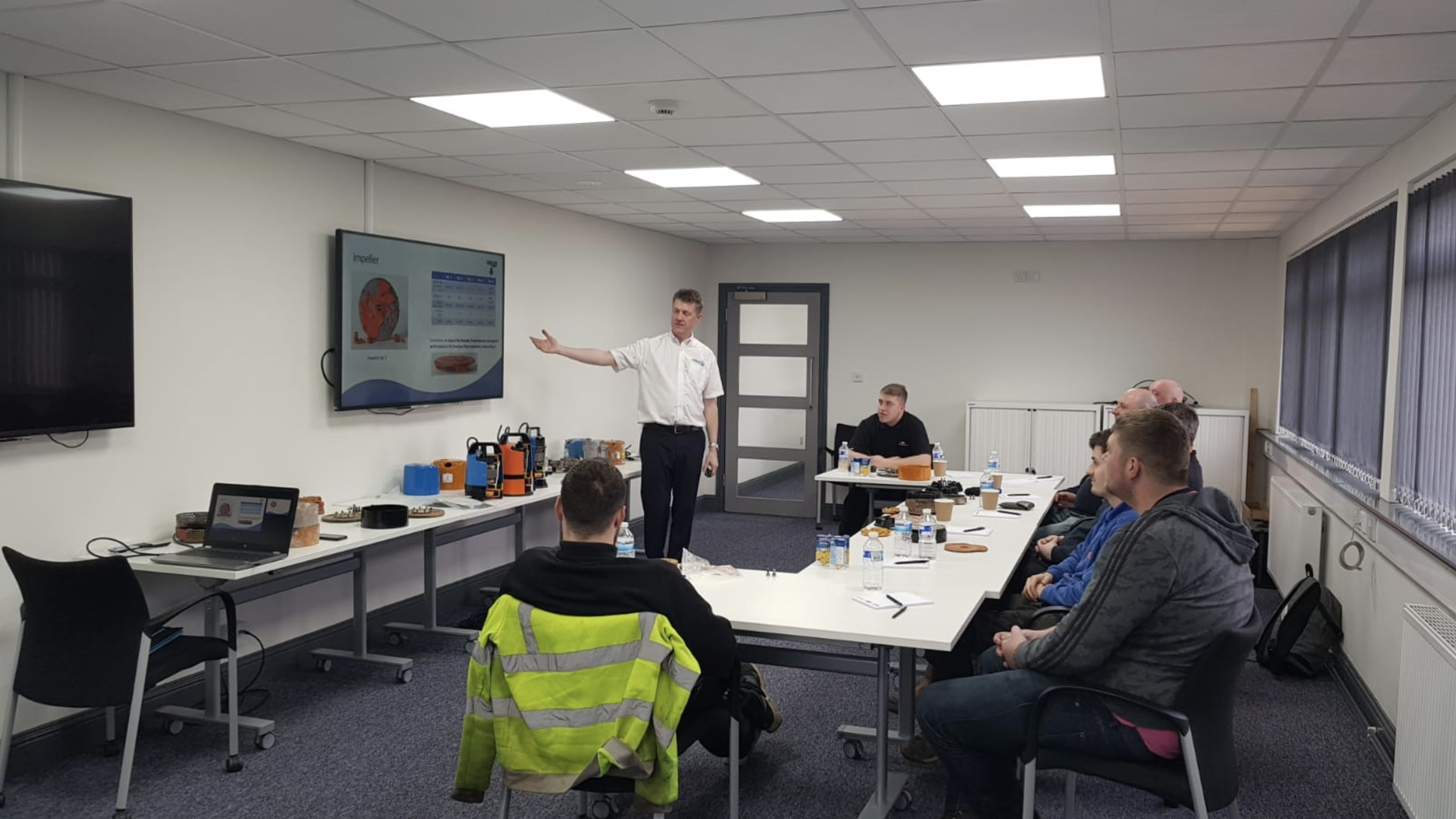 Matthew Hill with participants on the Tsurumi pump training course in Glasgow.