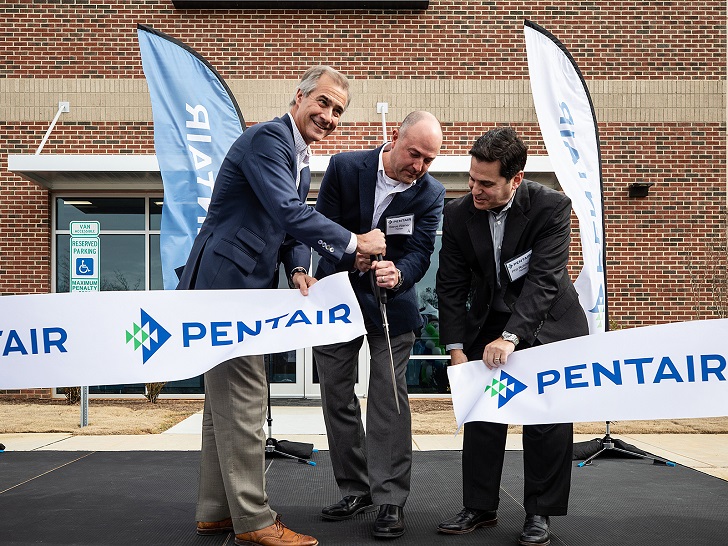 Pentair president and CEO John Stauch, Steve Risner, senior director of technology, and Phil Rolchigo, CTO, cut the ribbon at the opening of Pentair’s new innovation centre in Apex, North Carolina (Photo: Pentair).