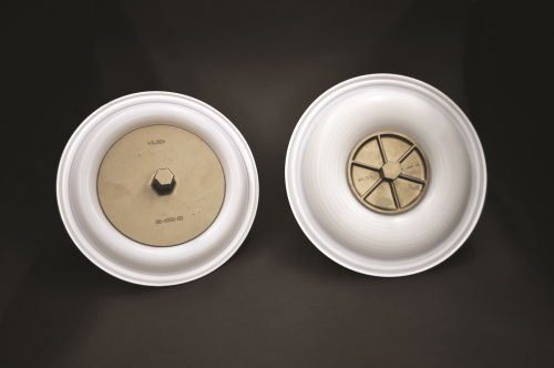 Wilden’s new full stroke PTFE (Teflon) diaphragms  (pictured on left) provide increased product displacement per stroke versus older, lower-flowing models (pictured on right).