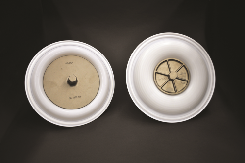 Wilden’s new full stroke PTFE (Teflon) diaphragms (pictured on left) provide increased product displacement per stroke versus older, lower-flowing models (pictured on right).