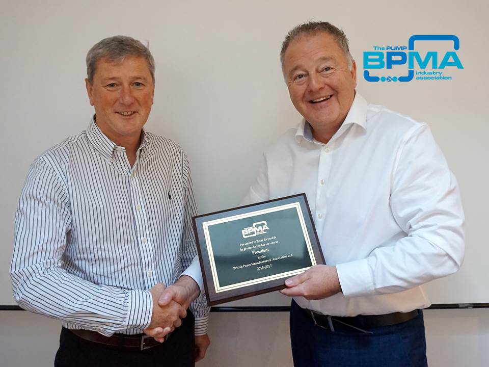 Duncan Lewis (left), the new president of the BPMA, presenting past president Peter Reynolds (right) with a plaque thanking him for his service.