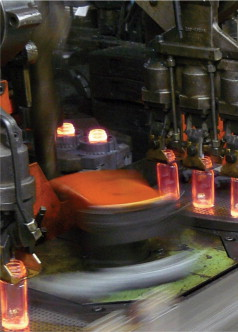 Figure 1c. Glass production – final precision forming of containers.