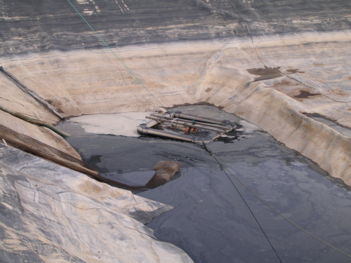 A waste leachate basin used for the storage of leachate waste that is stored until it can be disposed of safely.