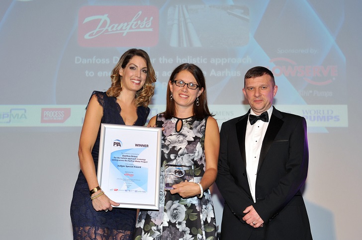 Sara Bernard, centre, UK marketing and business support at Danfoss is presented with the Judges' Special Award at the 2018 Pump Industry Awards by  journalist and presenter, Andrea Byrne. Alex Onslow, commercial manager, Flowserve SIHI, who sponsored the award, is on the right.