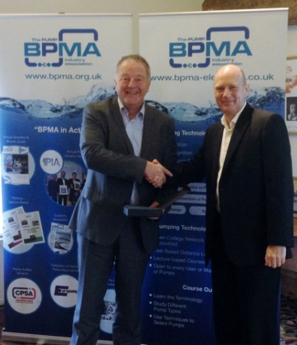The newly elected president of the BPMA, Peter Reynolds (left), presents a token of thanks to Andy Ratcliffe (right), for his services during his presidency.