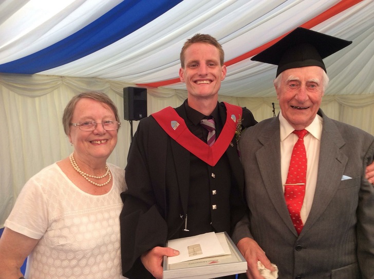 Jamie at his graduation in 2014 with his grandparents, Peter and Sheila Knight.
