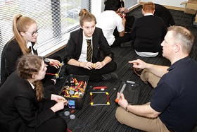 Rolls-Royce design engineer and STEM Ambassador, Ian Crowston talking with students about the IMechE challenge at an earlier Engineering Extravaganza.