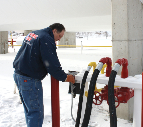 Figure 2. Greg Pirkl, president of Pirkl Gas Inc activates the shutoff valves at his recently upgraded bulk plant.