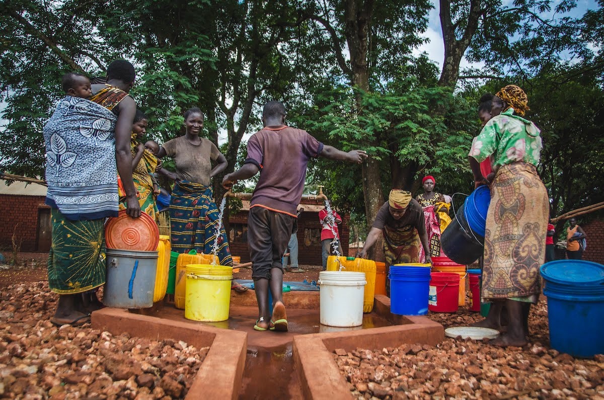 Community members in Zeze, Tanzania collect safe, clean water from Grundfos technology and solar-powered water systems installed by Water Mission. Photo: Water Mission.