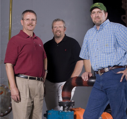 Figure 2. (Left to right) Doug Cumpston, Blackmer; Rick Fuqua, Northwest Pump & Equipment Co. and Scott Johnson, GEN-X Energy Group stand around the Blackmer XL Series sliding vane pump.