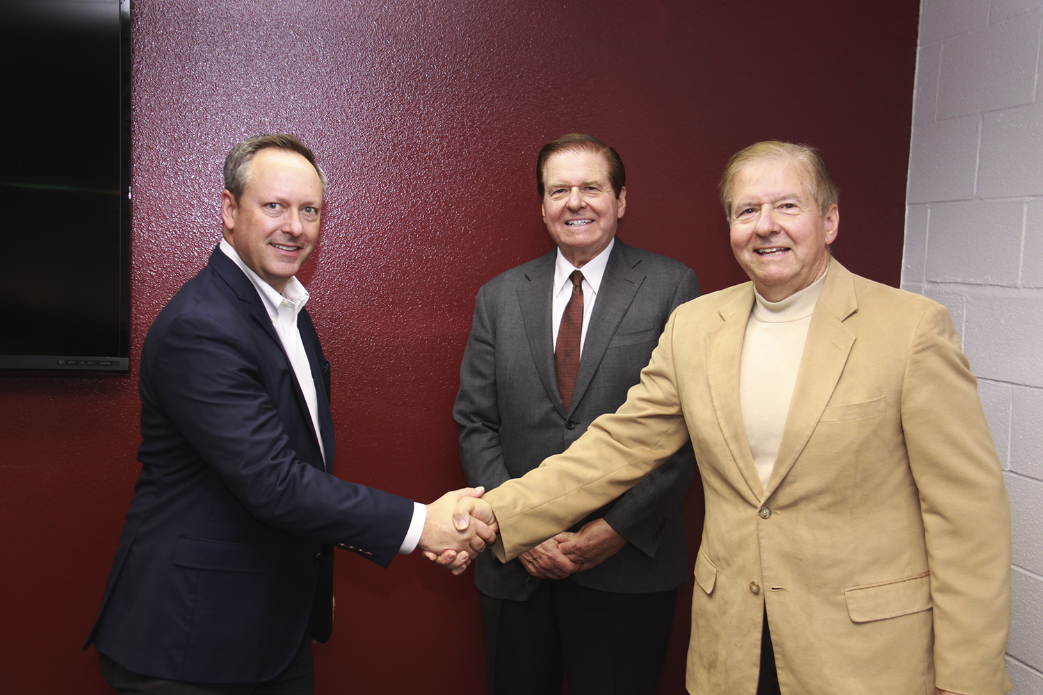 (Left to right) Jim Mugford, president of Sulzer Electro Mechanical Services, Wallace Brithinee and Donald Brithinee.