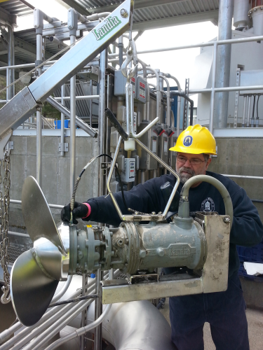 Riccardo DeCarli, Mechanic at Staffrod WPCF, carrying out routine maintenance on a Landia mixer.