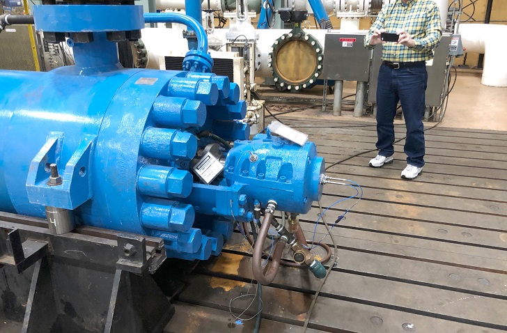 Client takes photos while his pump is being tested. (Photo courtsey of Hydro Inc)