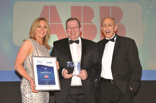 Ian Allan, centre, Local Business Unit Manager - Motors & Generators, collected the award on behalf of ABB. He is flanked by PIA host Helen Fospero and category sponsor Peter Ullman of Process Industry Informer.