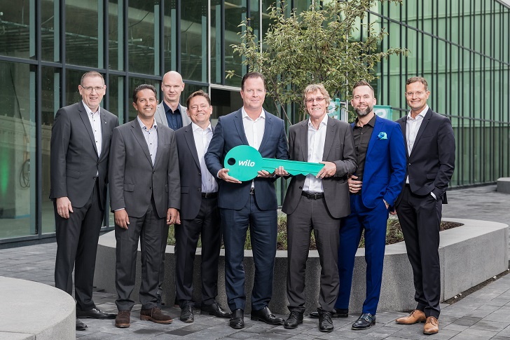 Wilo CEO Oliver Hermes receives the key to the new Smart Factory at Wilopark in Dortmund, Germany.