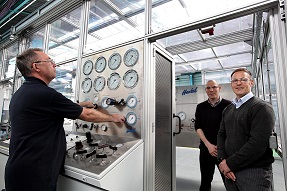 Left to right: Haskel’s Ronnie Marshall, Mark Adams and Dave Angus at the new test cell room.