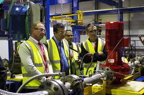 Delegates view new pump test rig during Past Present Future event factory tour