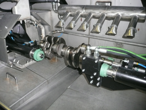 HIgh-pressure jets replace conventional brushes in the new crankshaft wash machine developed by HMM-UK for a Mexico engine plant